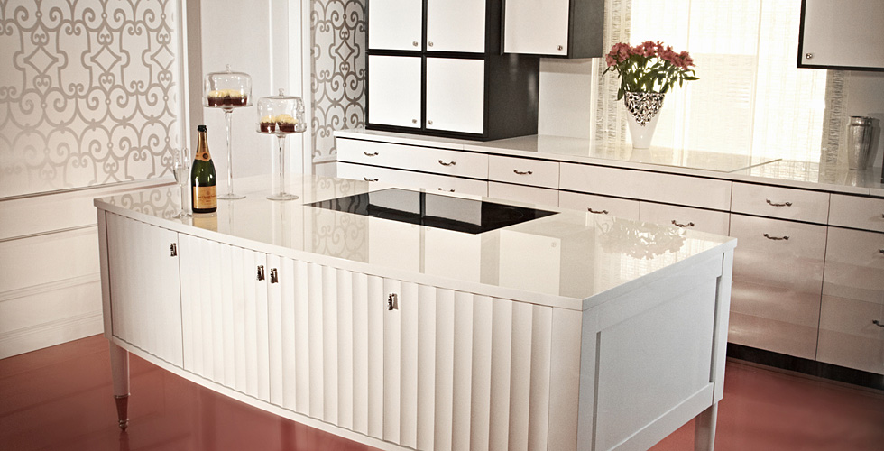Coco Chanel - Curved custom and fluted kitchen in cherry and