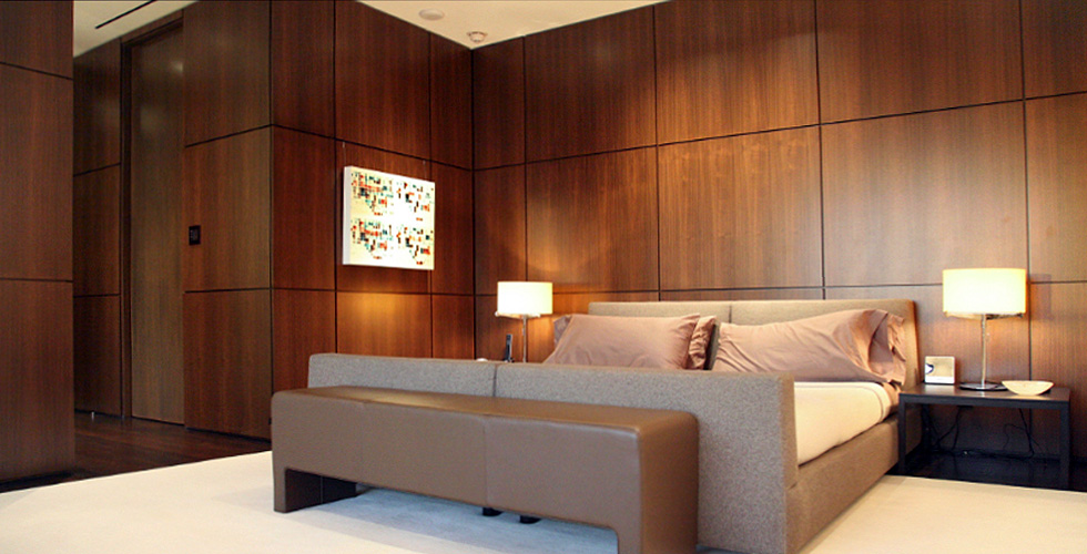 Contemporary cabinetry in the kitchen, bathroom, bedroom and office.