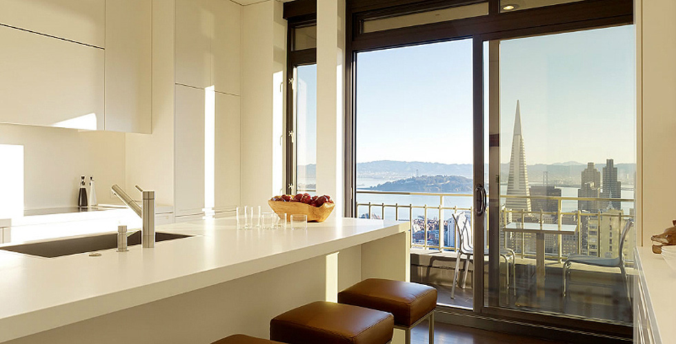 Contemporary cabinetry in the kitchen, bathroom, bedroom and office.