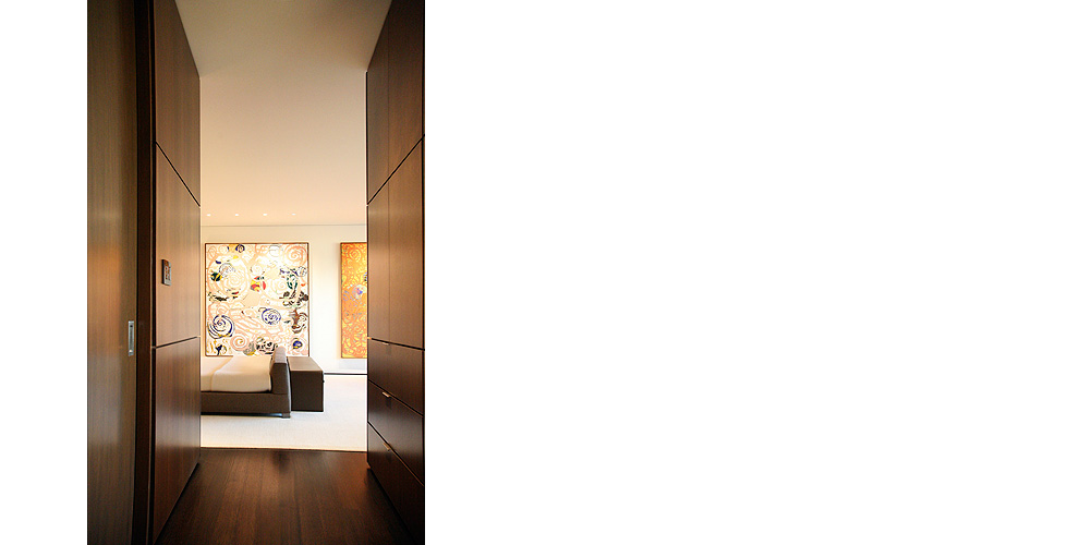 Contemporary cabinetry in the kitchen, bathroom, bedroom and office.