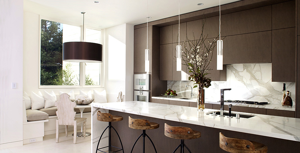 Contemporary kitchen features dark stained cabinets