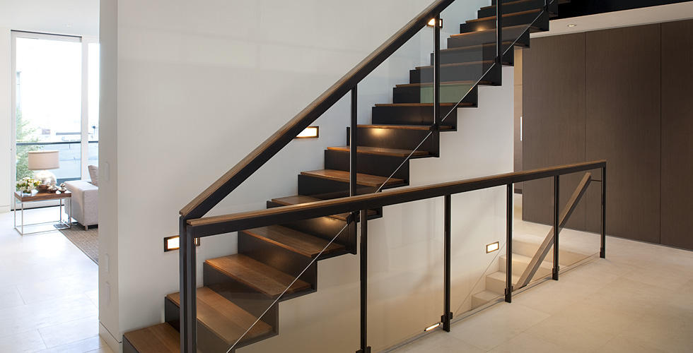 Contemporary wall paneling with dark stained.
