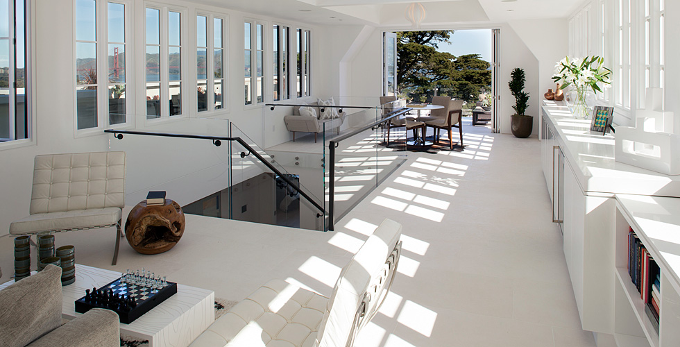 Contemporary living room with white high gloss cabinetry